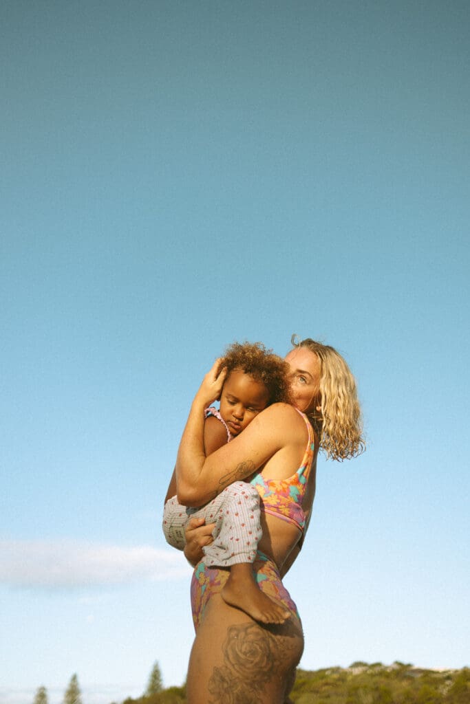 Mother embracing her child in Evans Head NSW